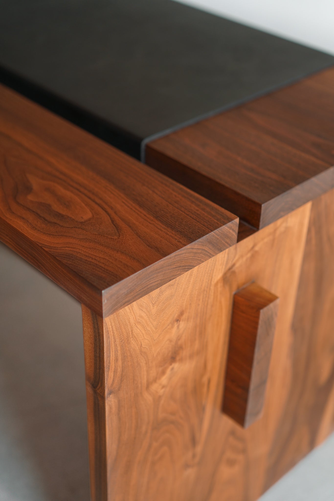 Carter desk-  close up on walnut wood and leather detail 