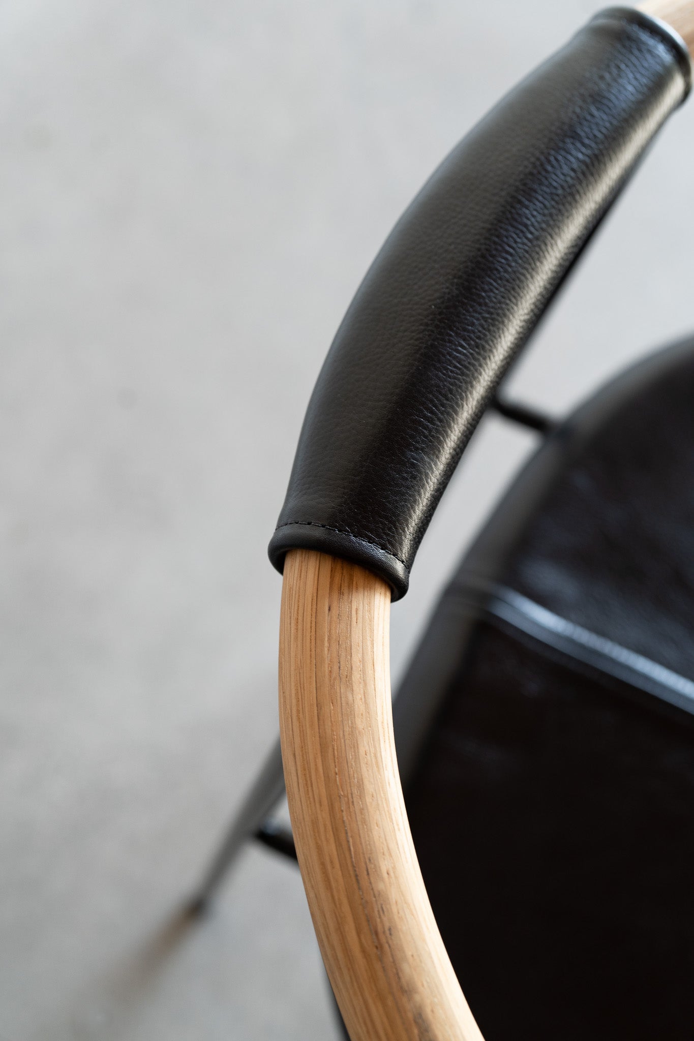 Cleo dining chair - black leather close up 