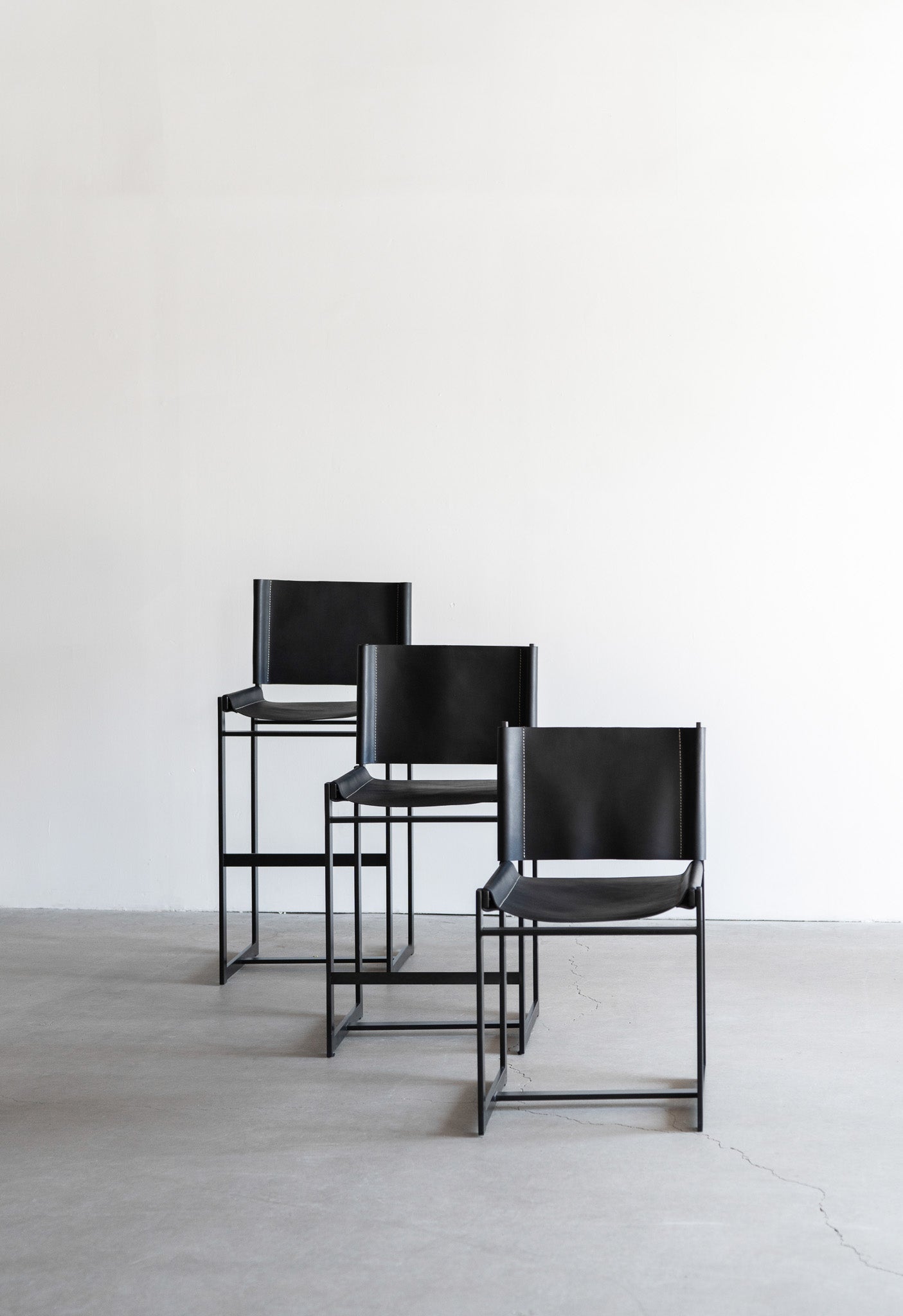 latigo bar stools - steel legs with black leather 