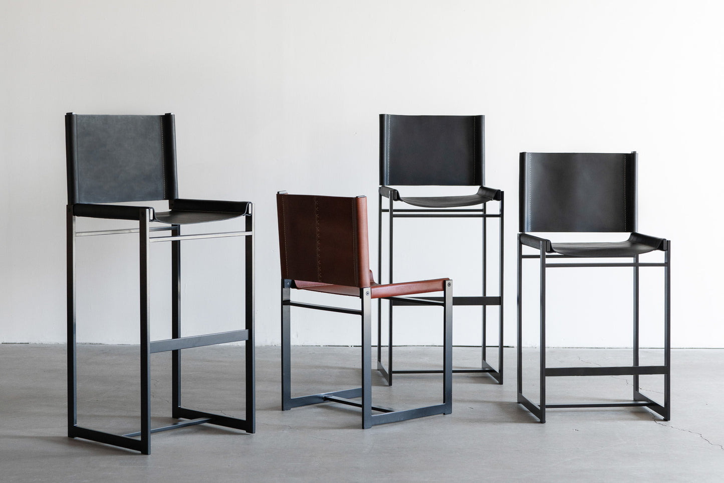 latigo bar stools - steel legs with black leather