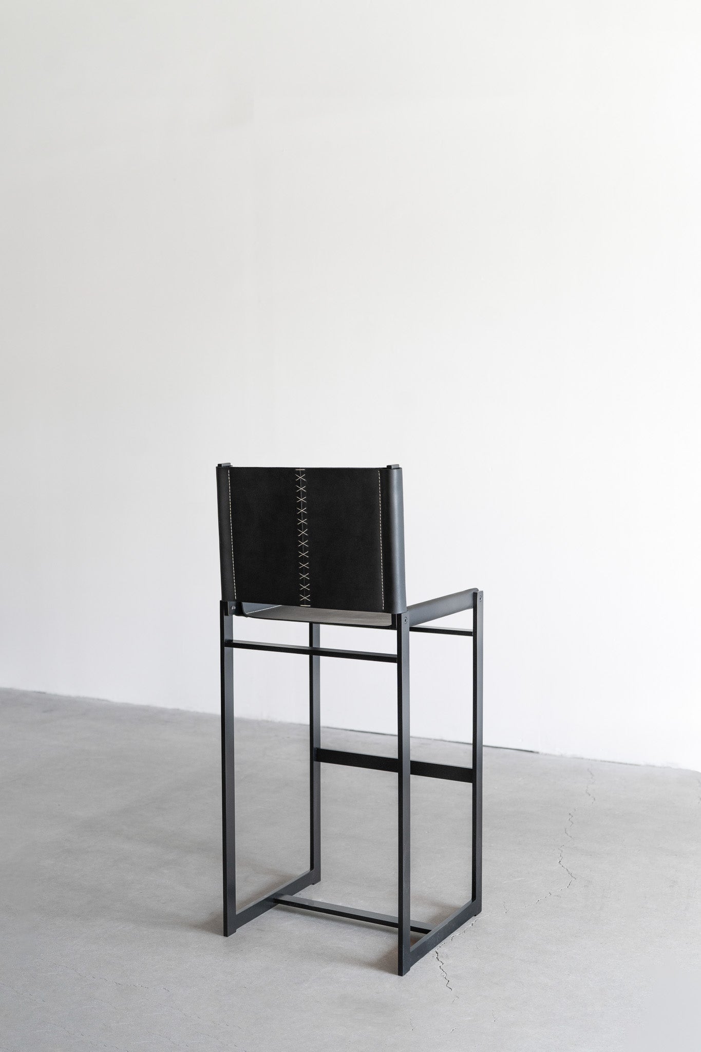 latigo bar stools - steel legs with black leather