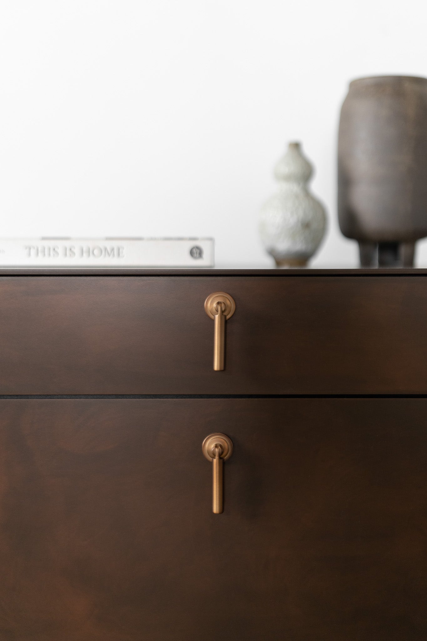 Lola nightstand - steel casing, close up on drawer handles 