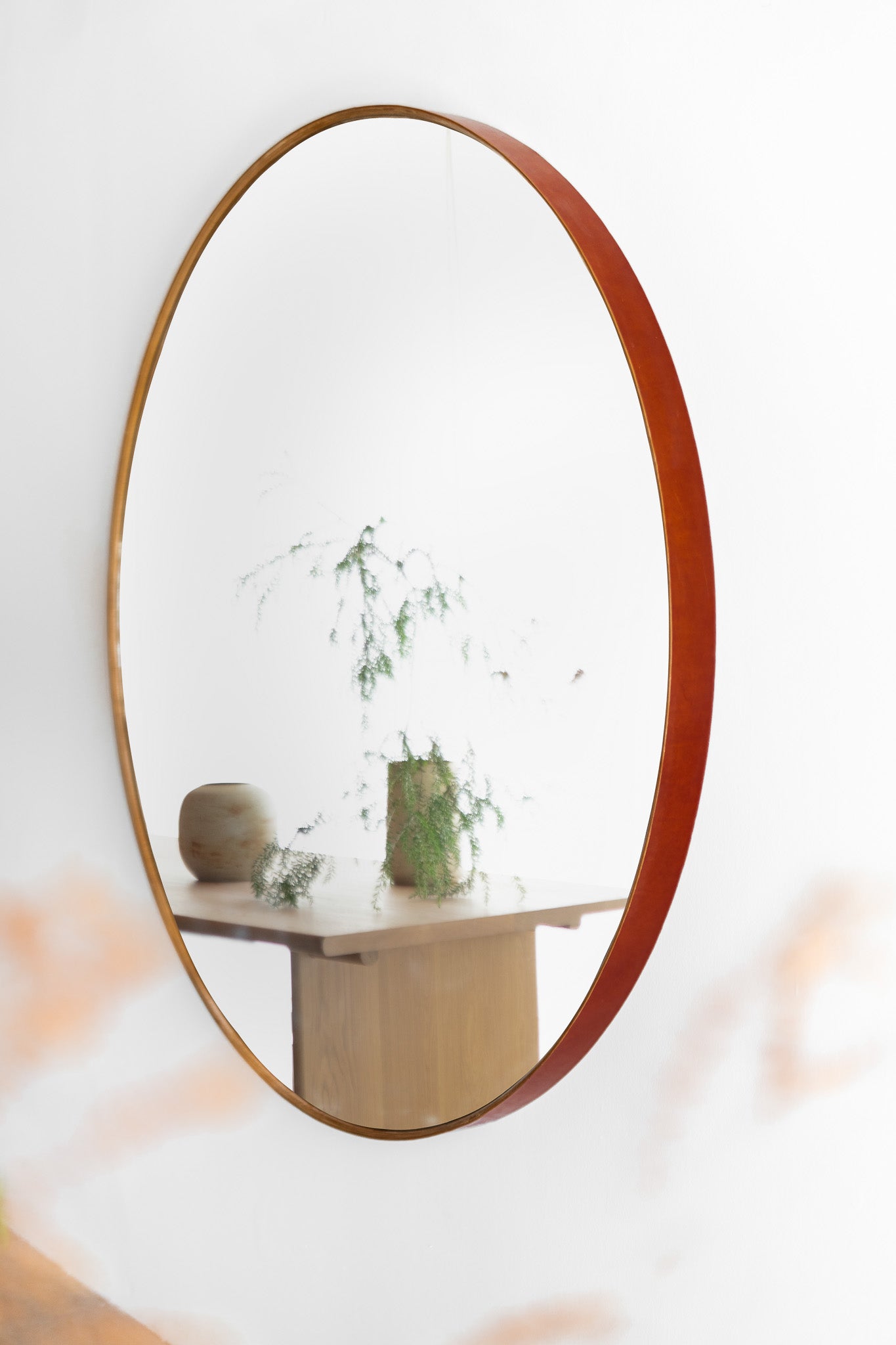 Reyes round mirror - wood mirror wrapped with tanned leather