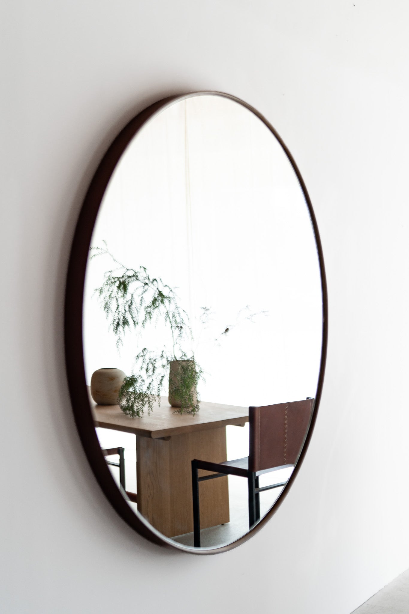 Reyes round mirror - wood mirror wrapped with tanned leather