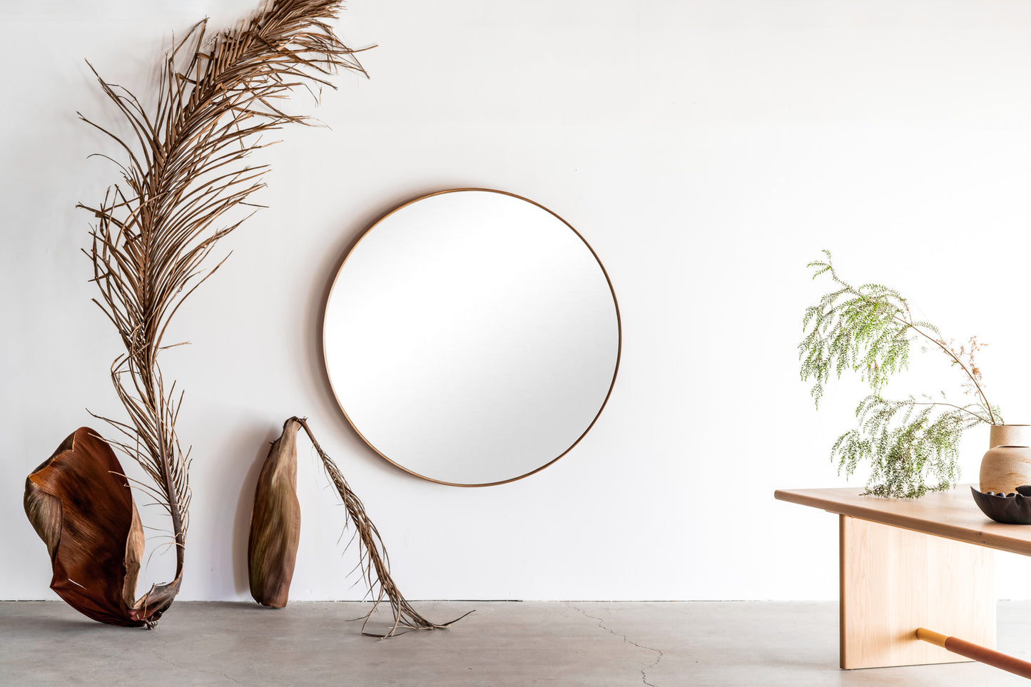 Reyes round mirror - wood mirror wrapped with tanned leather