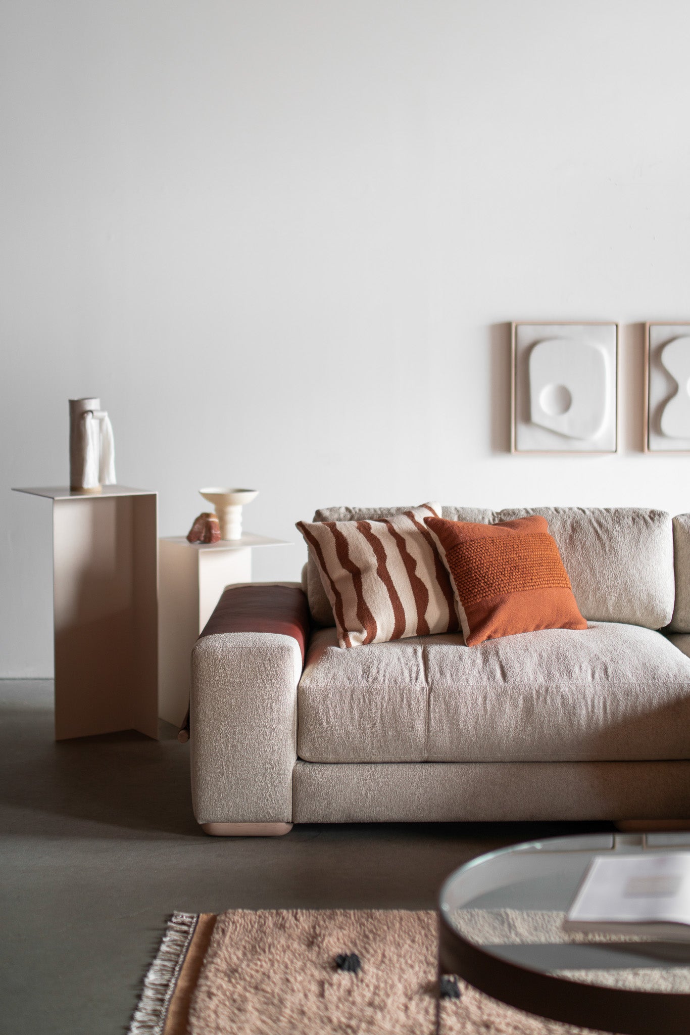 Side shot of Sofa with wood legs and leather arm