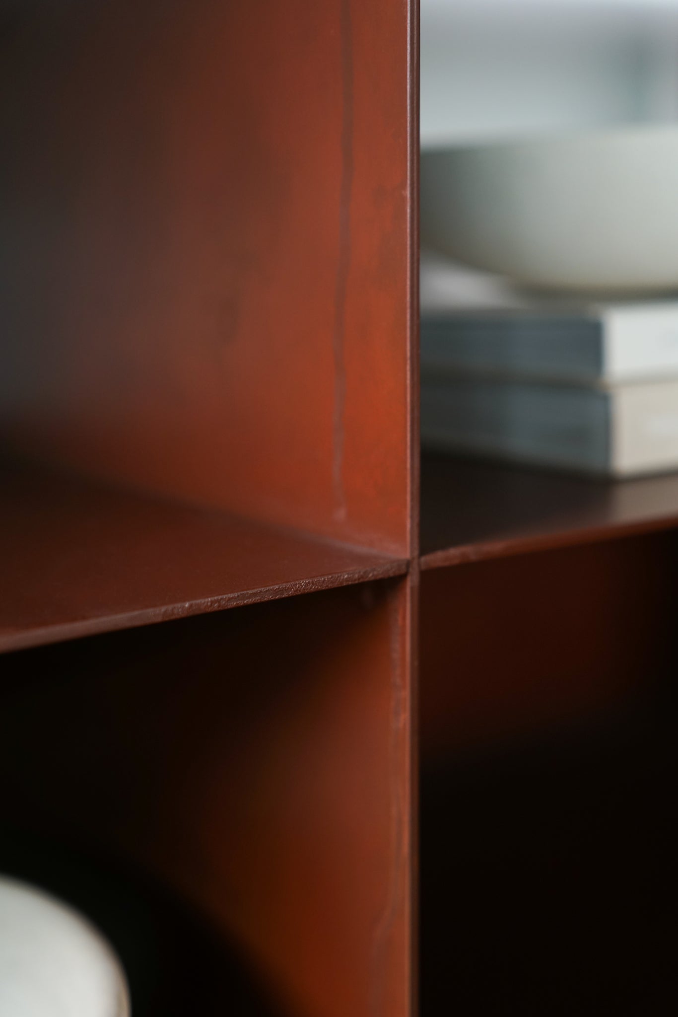 noah bookshelf - close up on patina steel