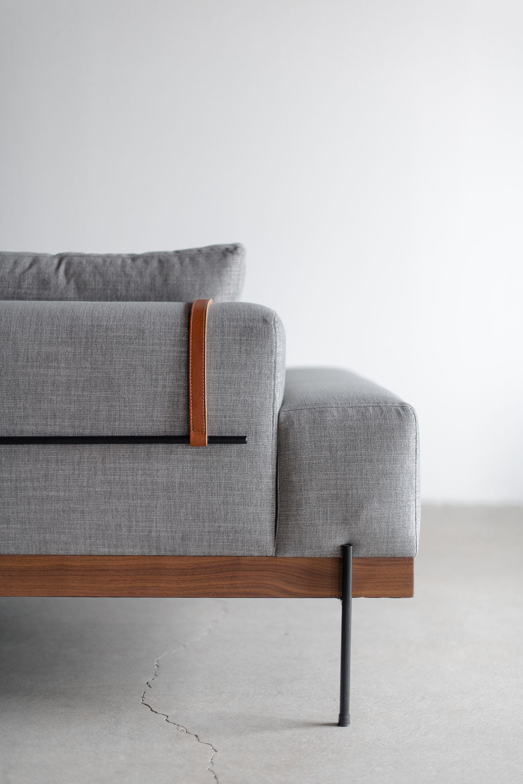 Rivera sofa- wood frame, steel legs and upholstered cushions 