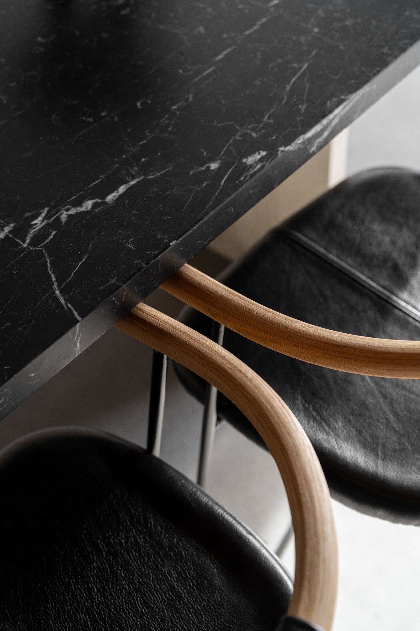 Cleo dining chair - black leather close up 