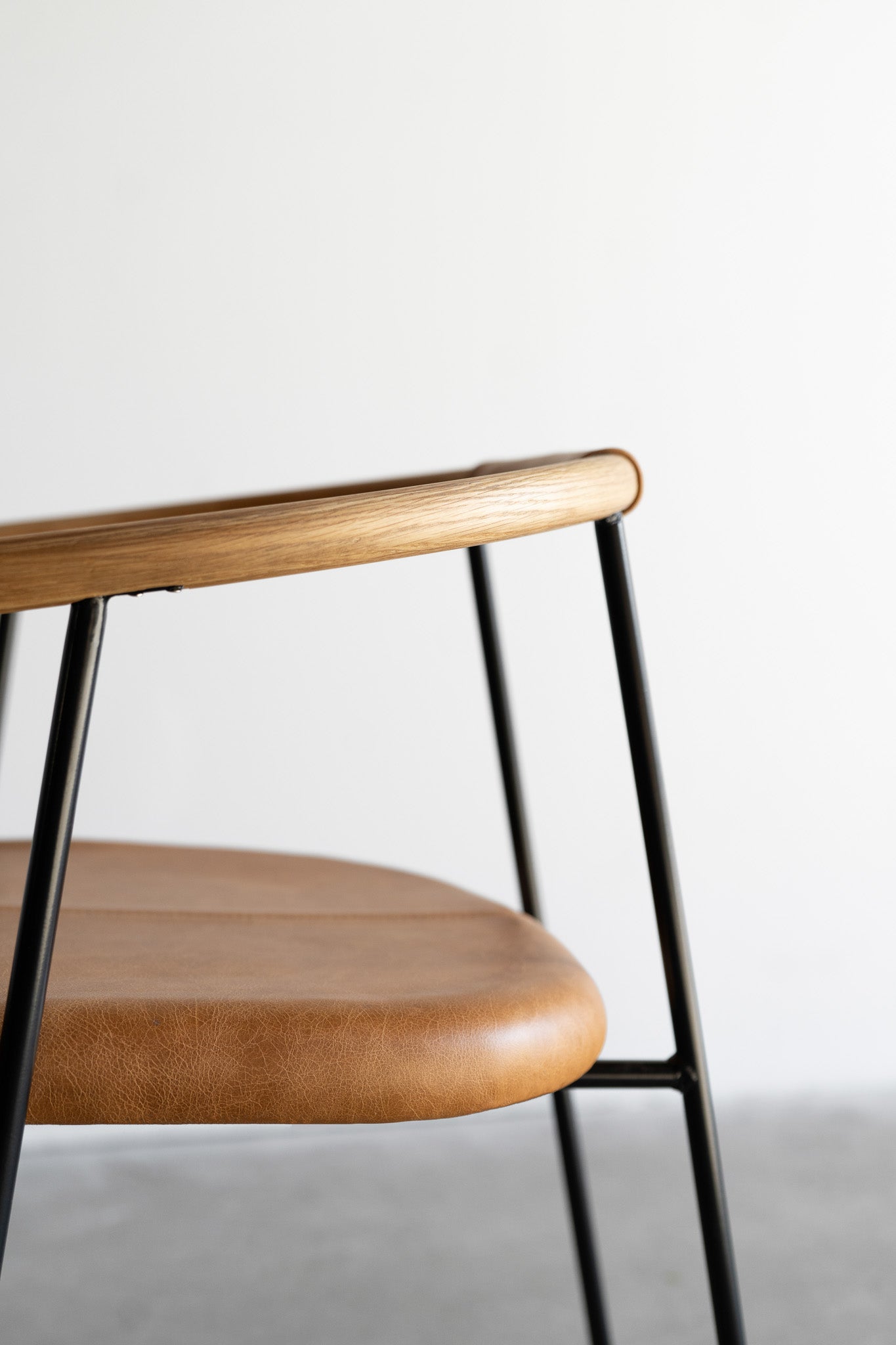 Cleo dining chair - close up on wood 