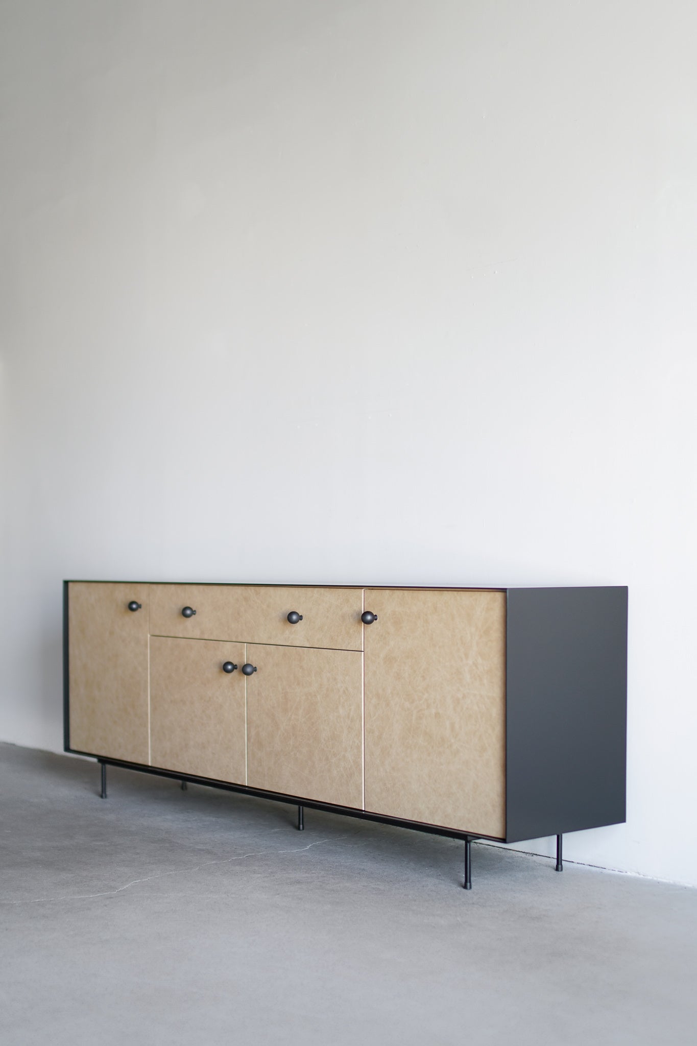Norah buffet- steel and wood cabinet with leather doors, full shot 