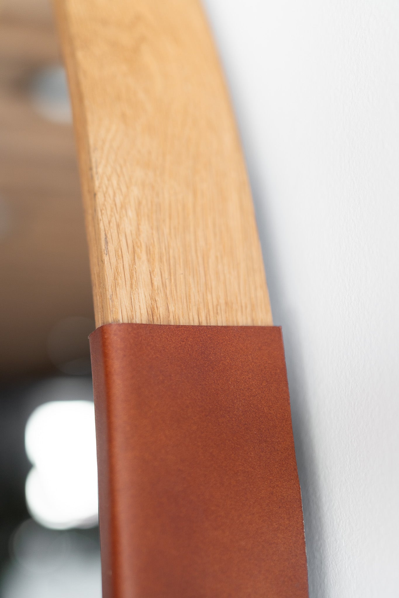 Carter mirror - close up on leather and wood details 