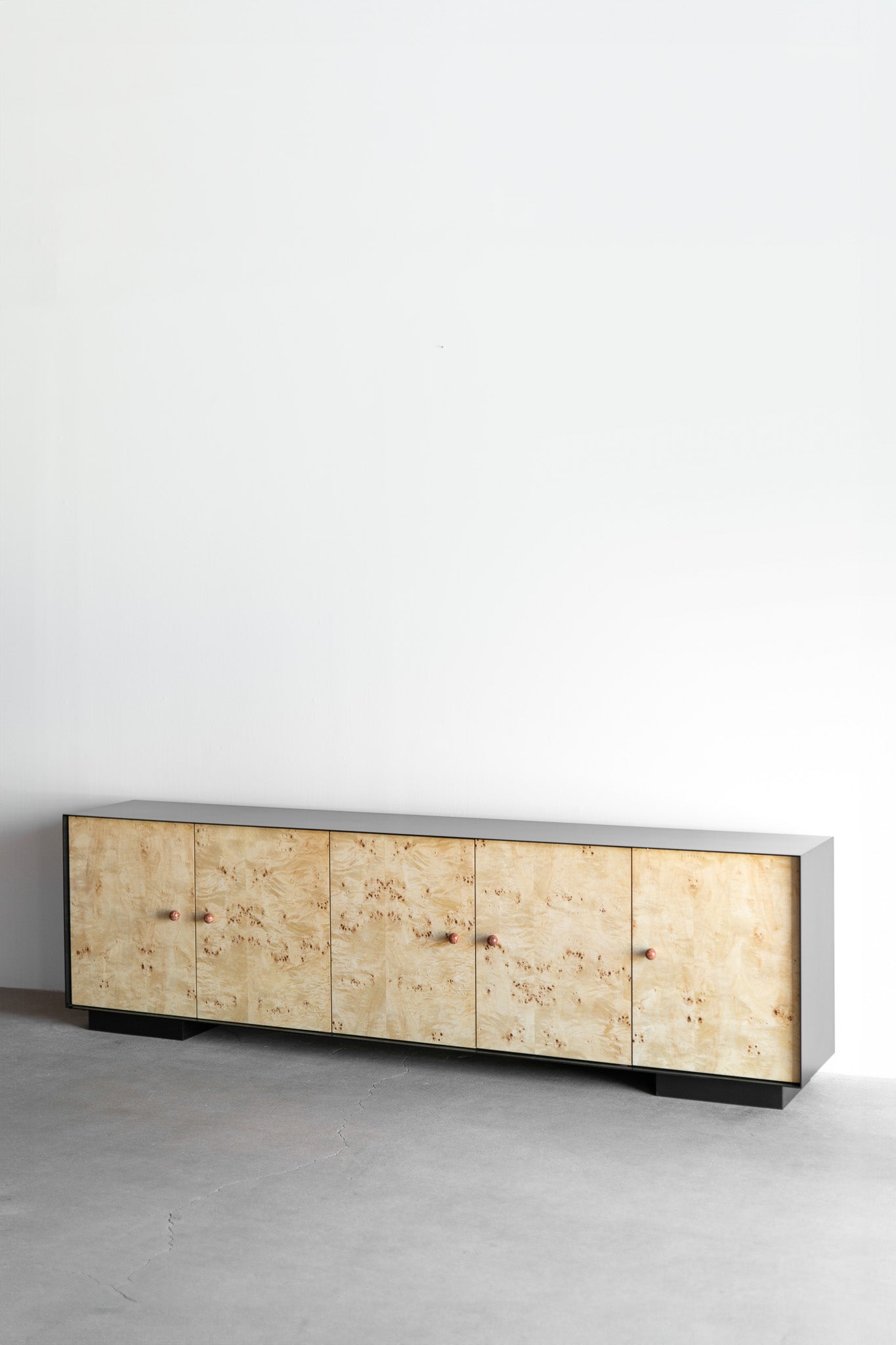 Solano credenza- Steel casing, burl doors with birch interiors