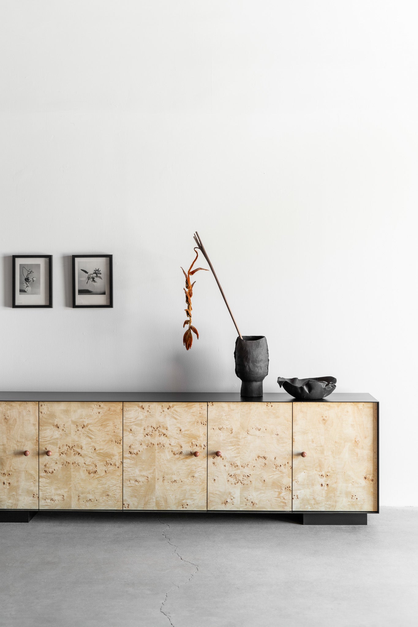 Solano credenza- Steel casing, burl doors with birch interiors 