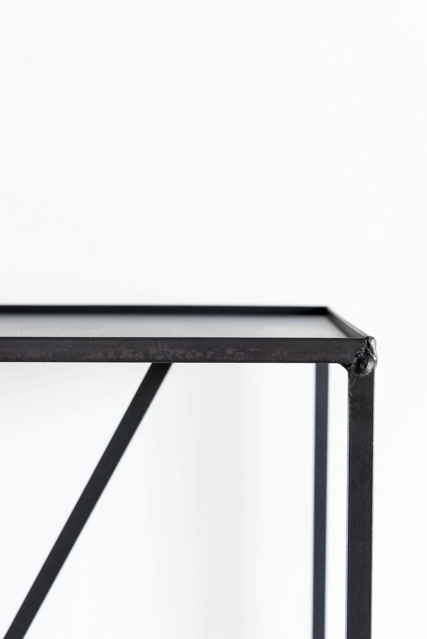 Arden Console steel table corner close up