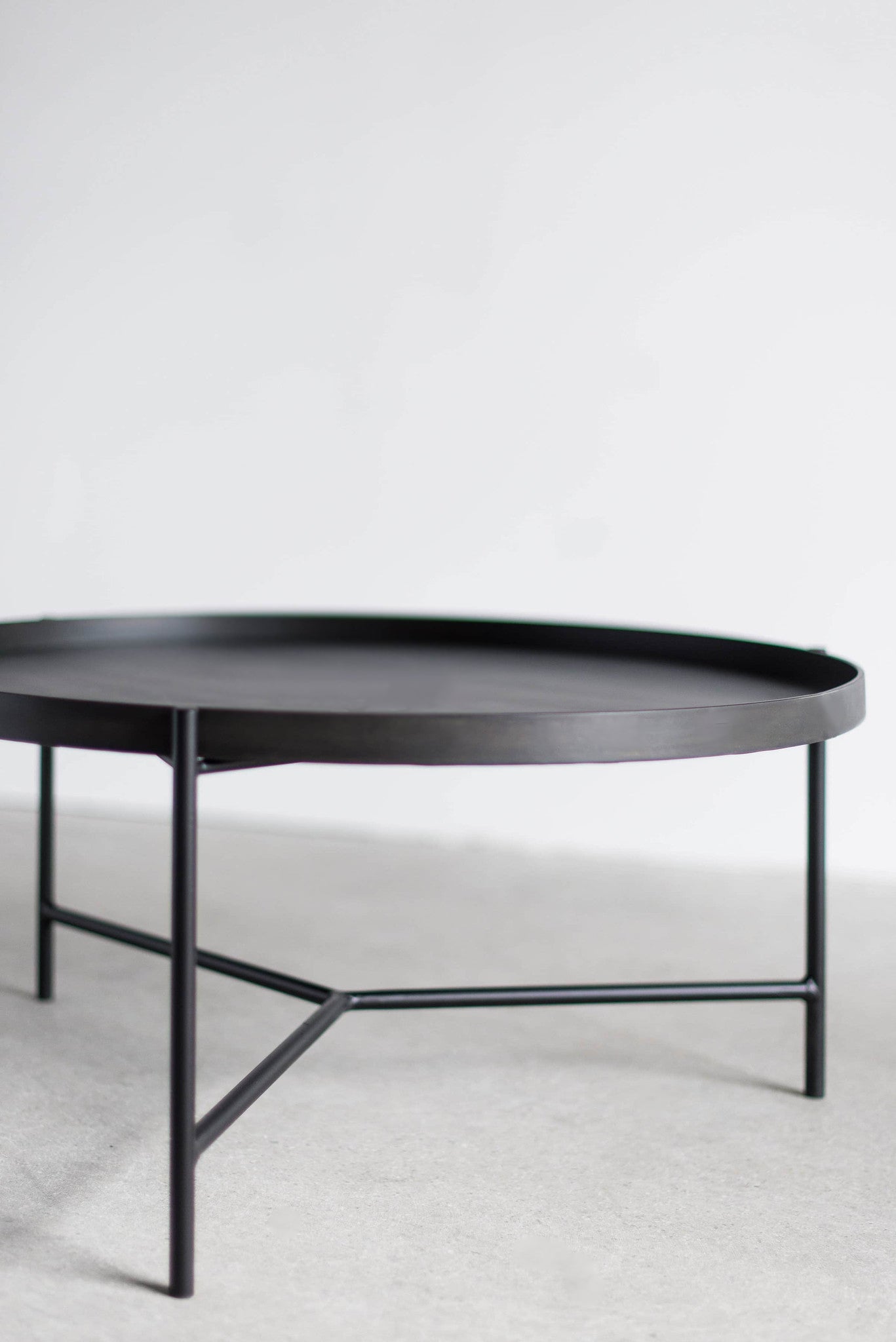 Bronson Coffee table - low shot of round all steel coffee table