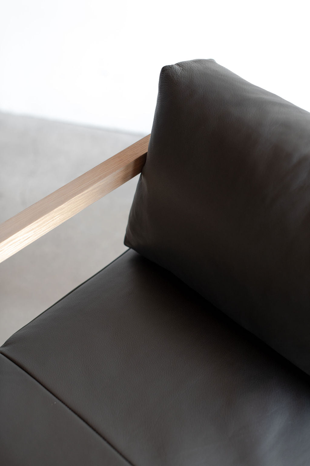 Eve dining chair - black leather, close up on leather 