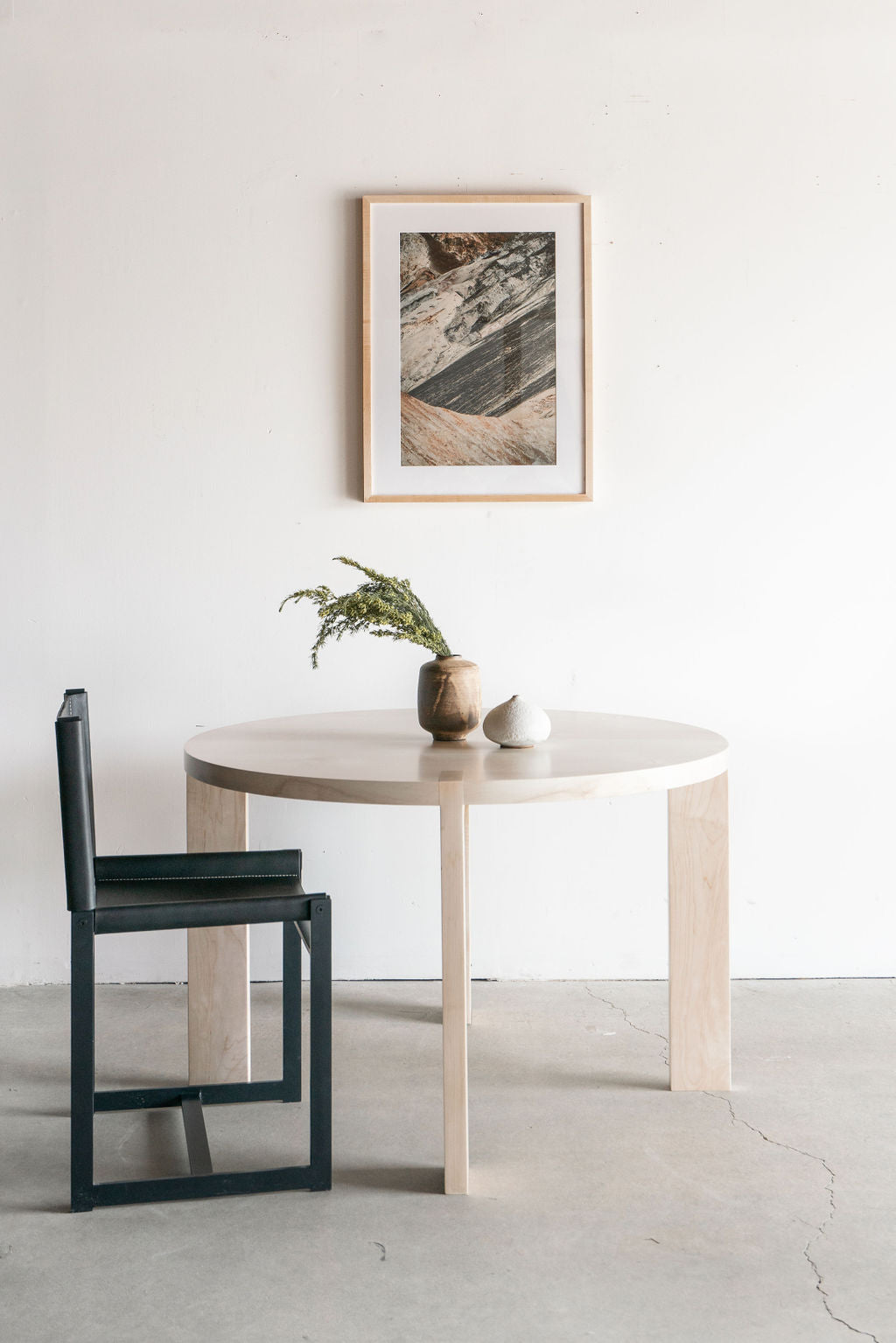 eve dining table  bleached maple - full shot, styled with chair 