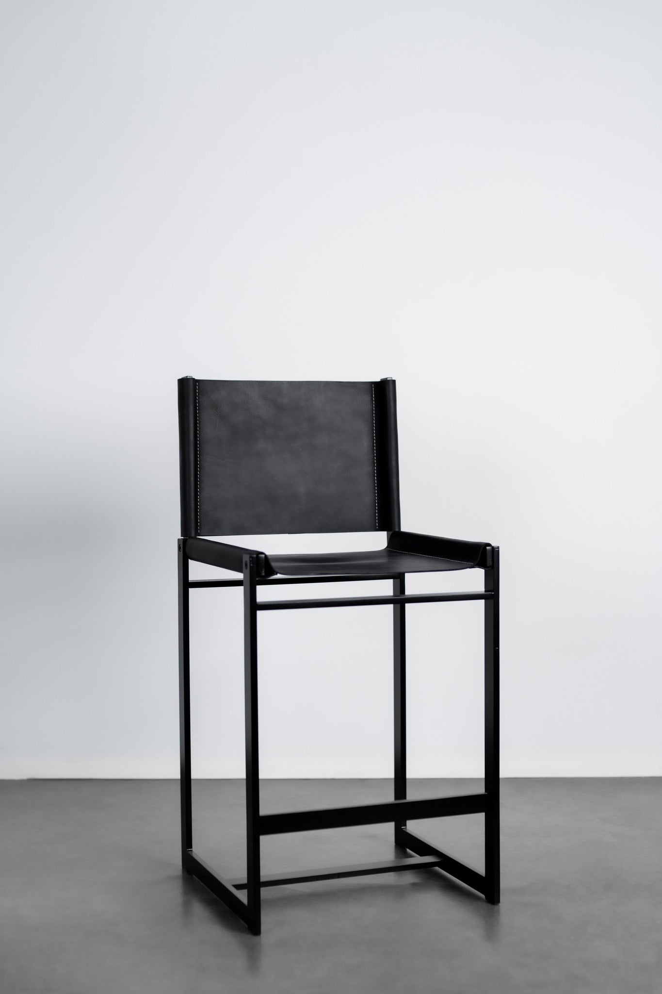 Latigo counter stool - steel legs with leather seat and back 
