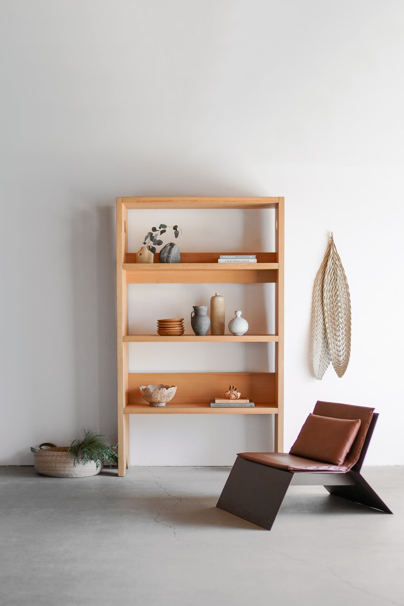 Milo bookcase styled with Tula lounge chair 